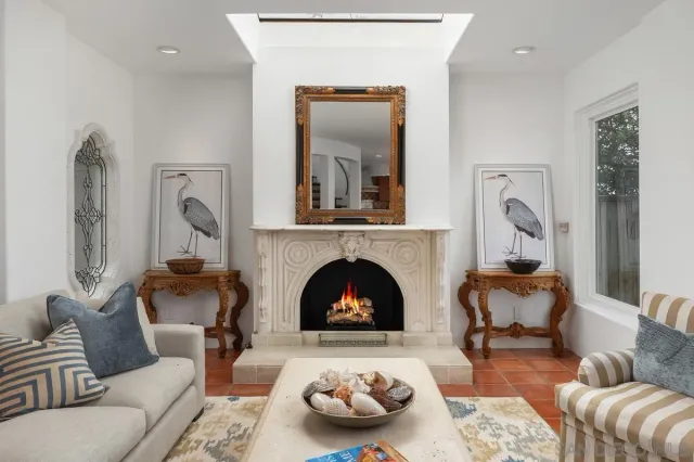 a view of kitchen island a sink and living room