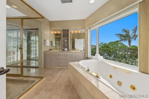 a view of entryway and hall with a window