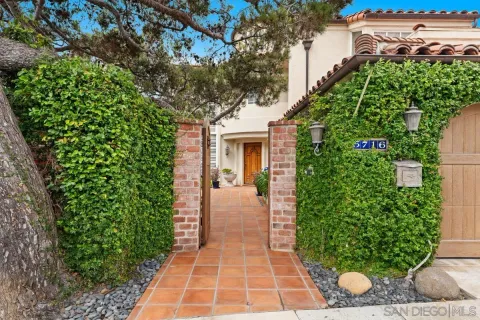 an aerial view of a house with swimming pool