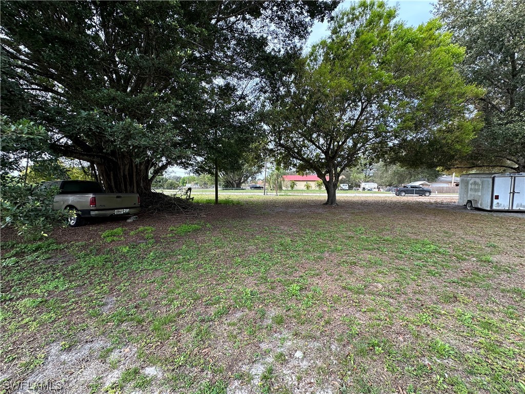 2404 Lake Trafford Road Immokalee, FL 34142 - Photo 9 of 9 a view of street with trees