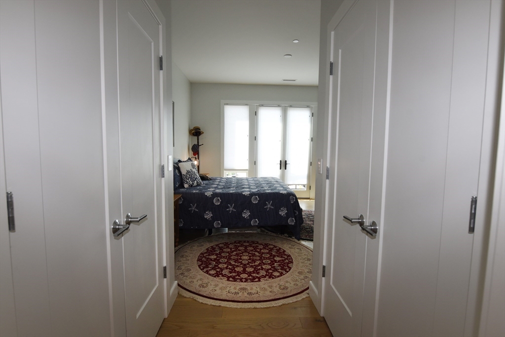 10 Shipyard Drive, Unit 313 Hingham, MA 02043 - Photo 19 of 39 a bathroom with a sink and a mirror