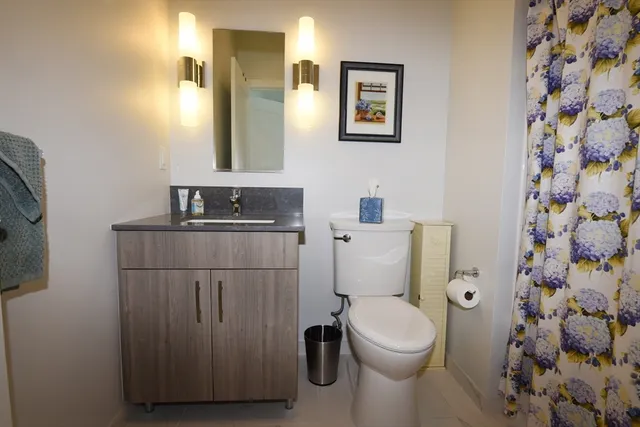 a bathroom with a toilet and a sink