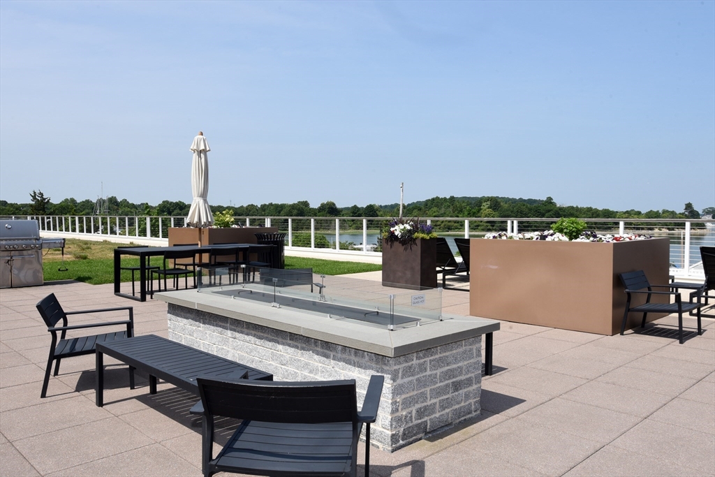 10 Shipyard Drive, Unit 313 Hingham, MA 02043 - Photo 29 of 39 a view of a terrace with chairs