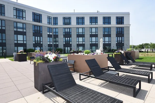 a view of a patio filled with furniture