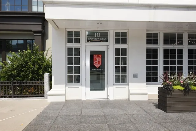 a view of a building with a potted plant