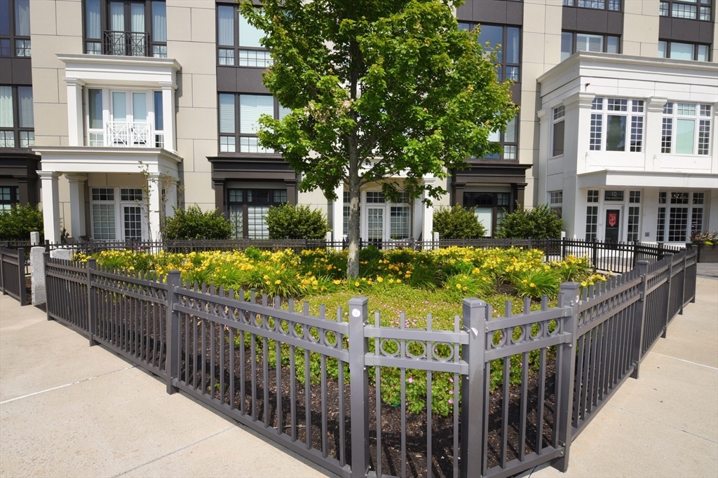 10 Shipyard Drive, Unit 313 Hingham, MA 02043 - Photo 34 of 39 a view of a house with wooden fence