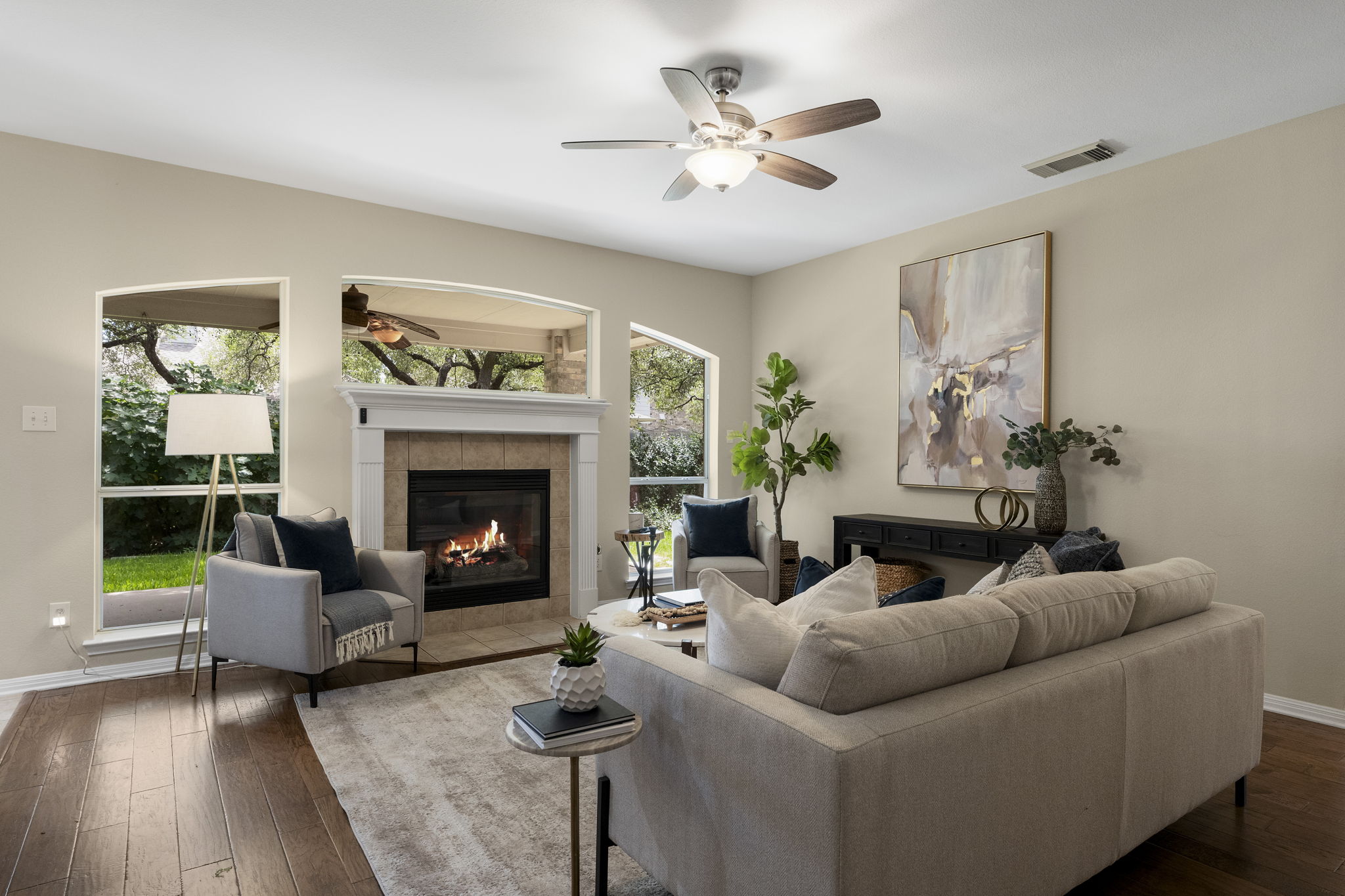 1822 Nelson Ranch Loop Cedar Park, TX 78613 - Photo 9 of 40 The spacious living room centers around a cozy fireplace with a classic mantel.
