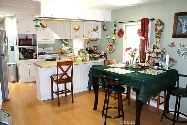 a view of a dining room with furniture