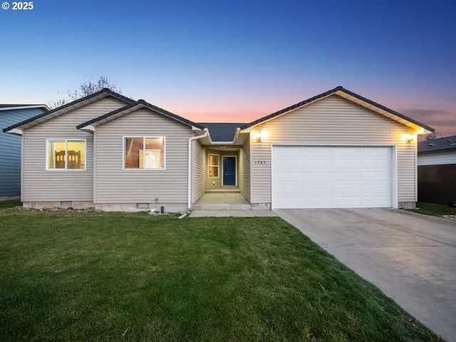 a house view with a garden space