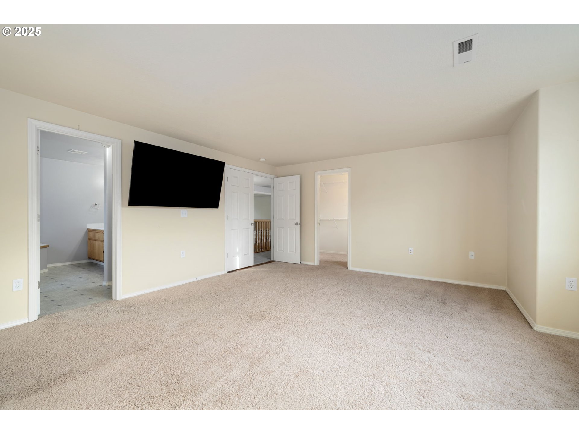 1311 Northwest 26th Avenue Battle Ground, WA 98604 - Photo 24 of 44 a view of a livingroom with a flat screen tv