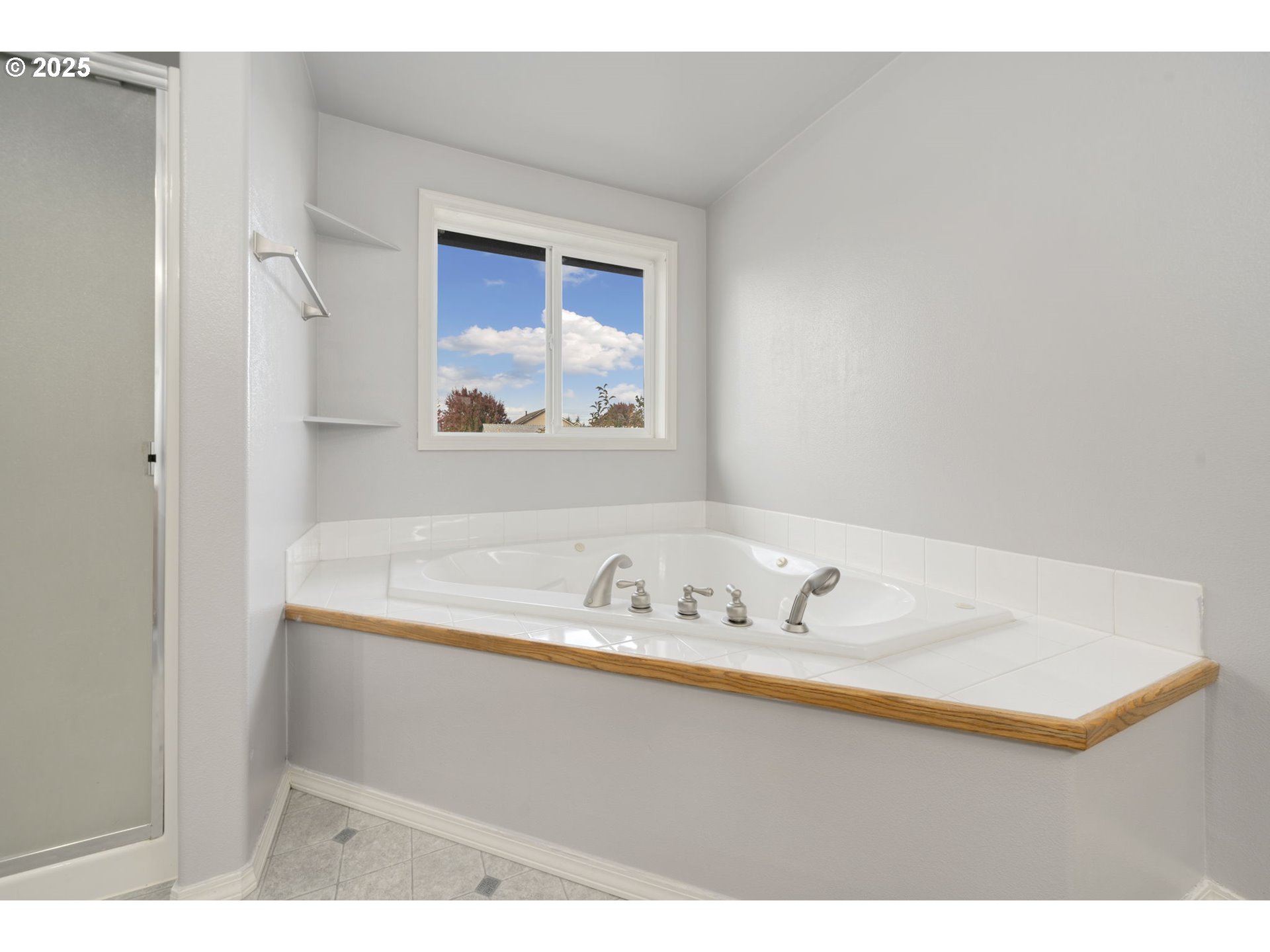 1311 Northwest 26th Avenue Battle Ground, WA 98604 - Photo 28 of 44 a bathroom with a sink and a mirror