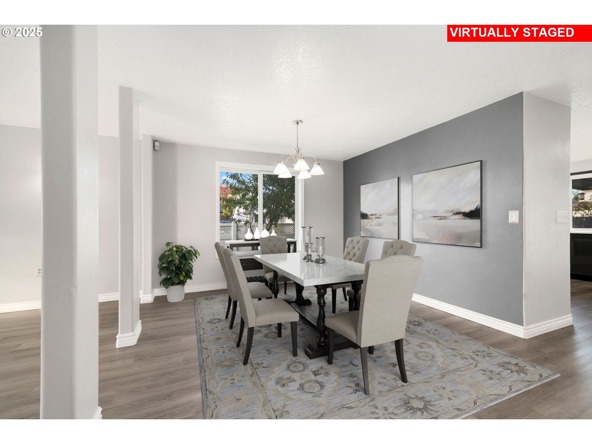 1311 Northwest 26th Avenue Battle Ground, WA 98604 - Photo 10 of 44 a view of a dining room with furniture and wooden floor