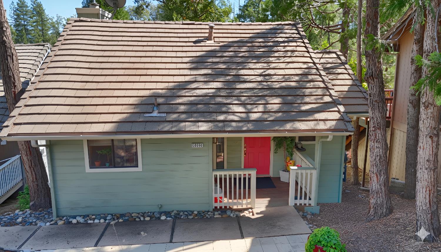50840 Smoke Tree Trail Bass Lake, CA 93604 - Photo 2 of 43 a front view of a house