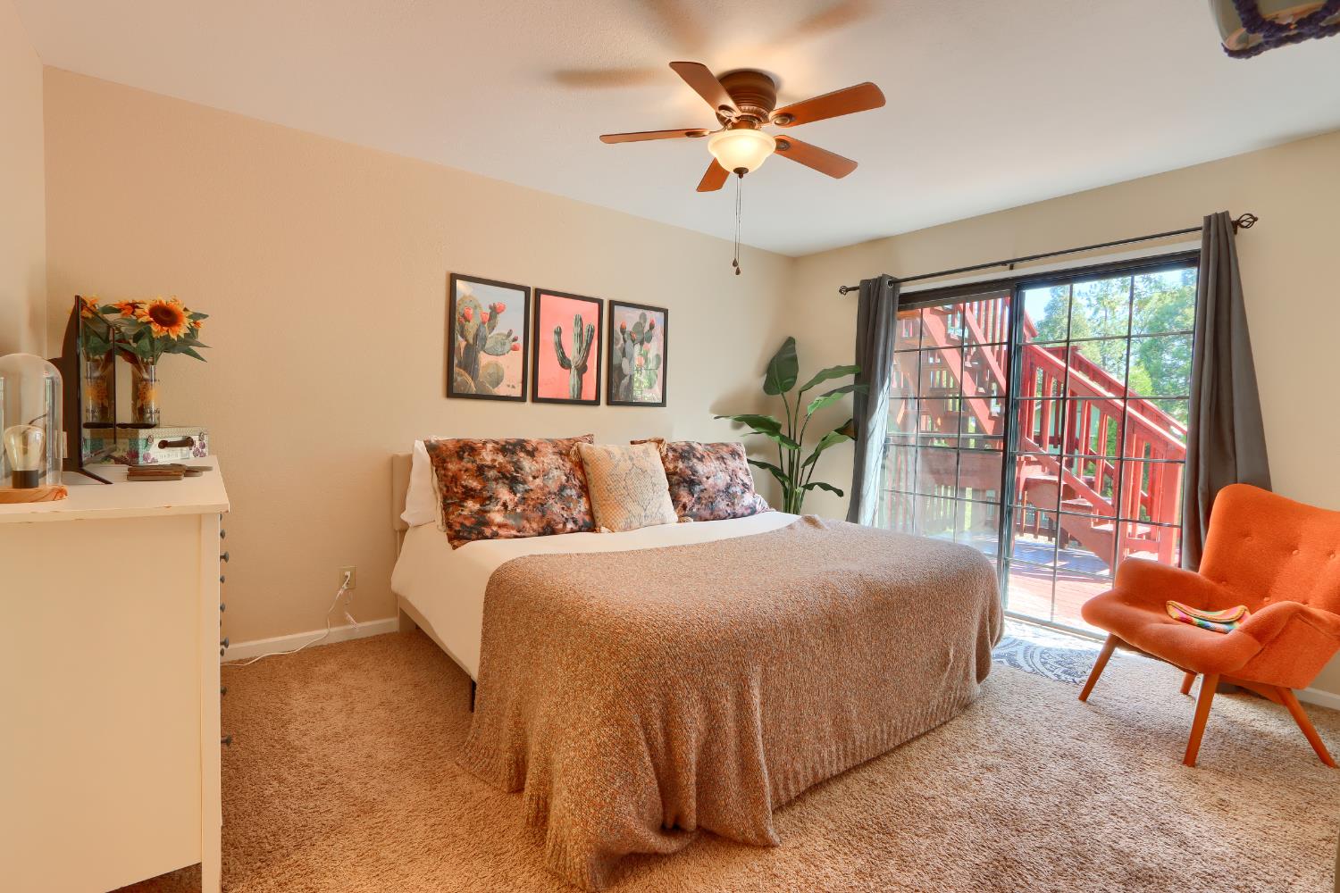 50840 Smoke Tree Trail Bass Lake, CA 93604 - Photo 26 of 43 a bedroom with a large bed and a chandelier