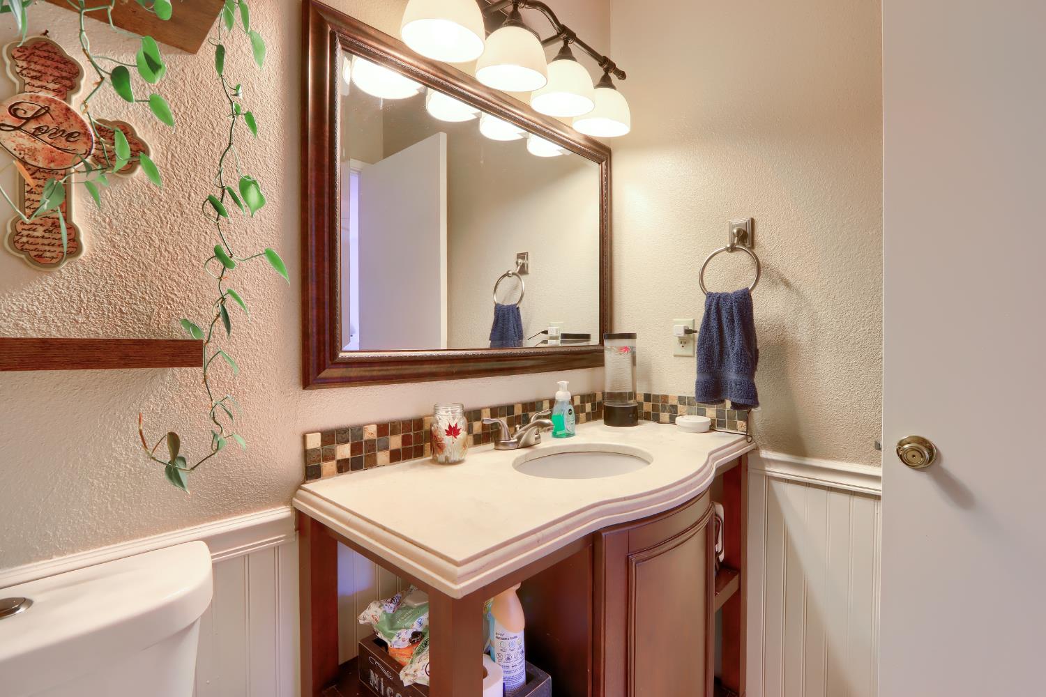 50840 Smoke Tree Trail Bass Lake, CA 93604 - Photo 31 of 43 a bathroom with a sink and a mirror
