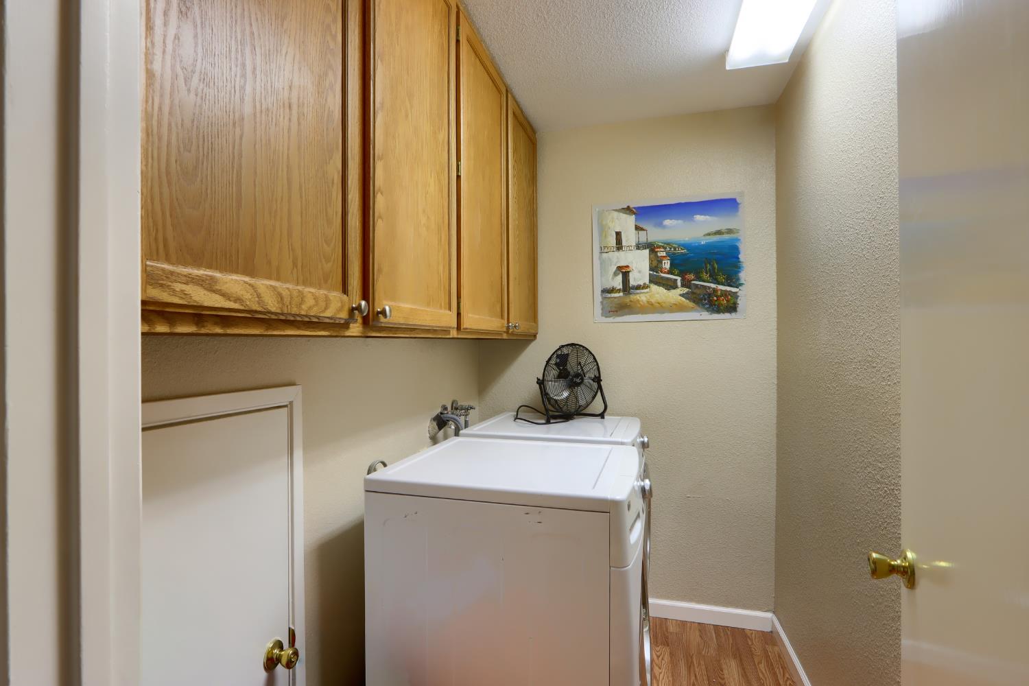 50840 Smoke Tree Trail Bass Lake, CA 93604 - Photo 33 of 43 a utility room with dryer and washer