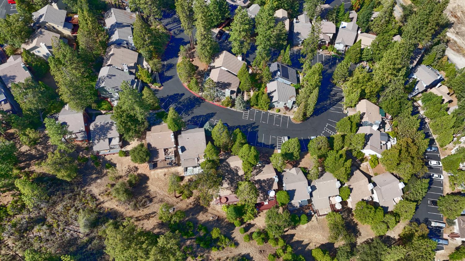 50840 Smoke Tree Trail Bass Lake, CA 93604 - Photo 39 of 43 an aerial view of residential house with parking and yard