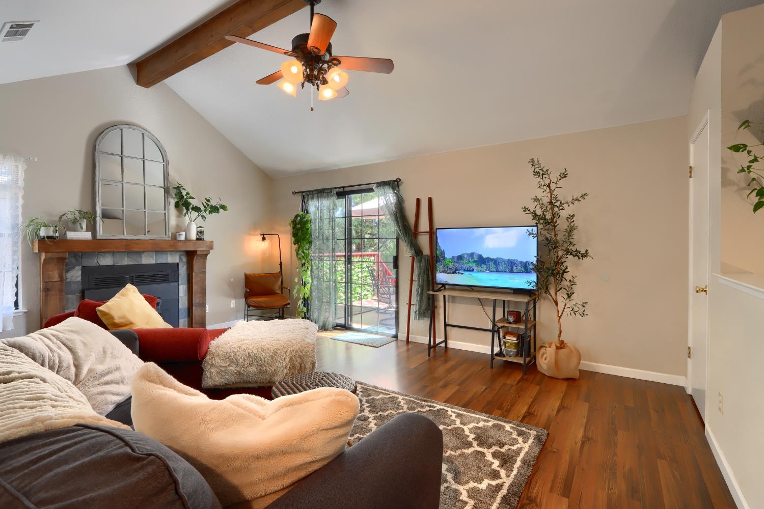 50840 Smoke Tree Trail Bass Lake, CA 93604 - Photo 7 of 43 a living room with furniture and a fireplace
