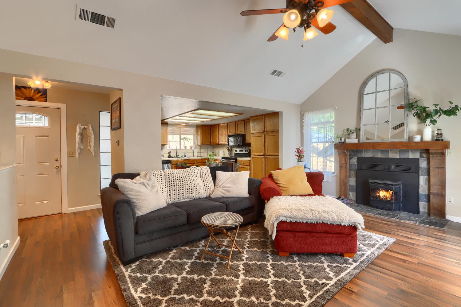 50840 Smoke Tree Trail Bass Lake, CA 93604 - Photo 8 of 43 a living room with furniture and a fireplace