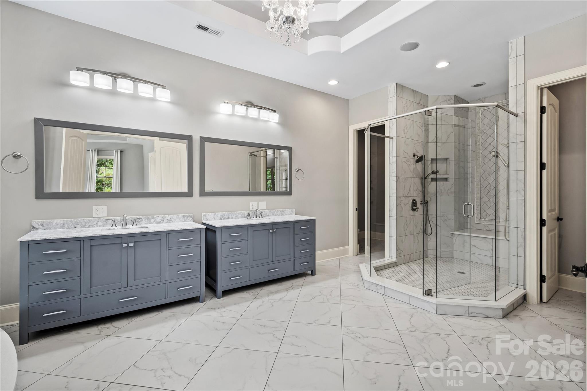 220 Fincher Road Pauline, SC 29374 - Photo 35 of 48 a bathroom with a mirror a double vanity sink and mirror