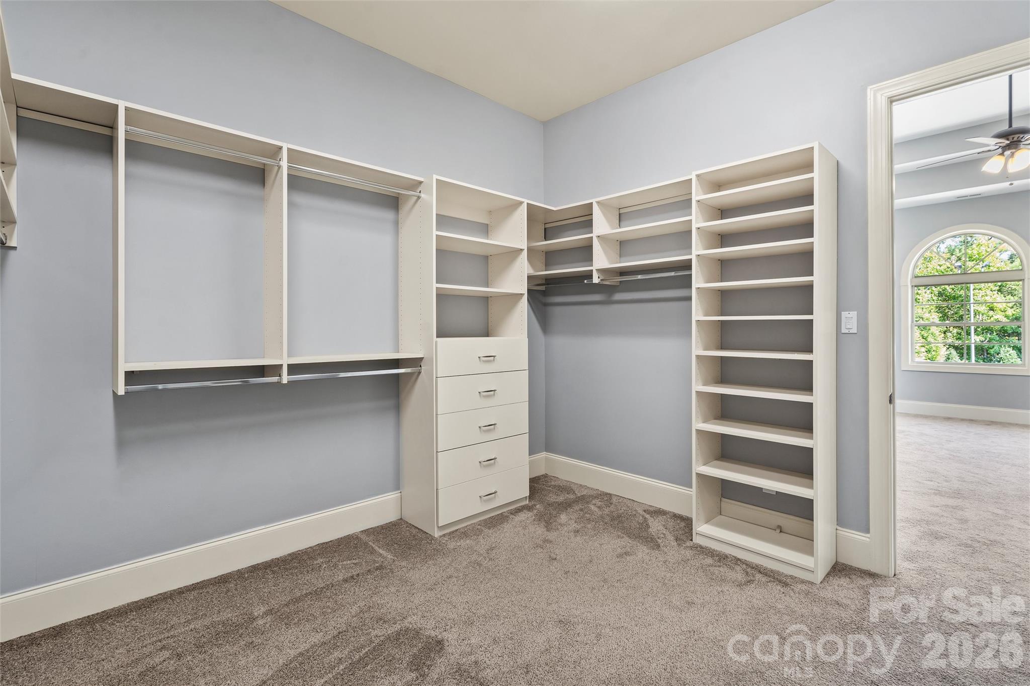 220 Fincher Road Pauline, SC 29374 - Photo 38 of 48 a view of walk in closet with empty racks