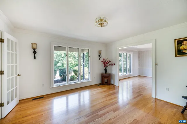 a view of a balcony with wooden floor
