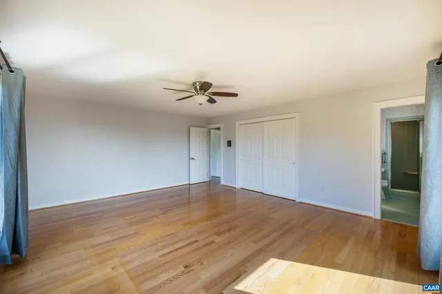 a view of a room with a large window