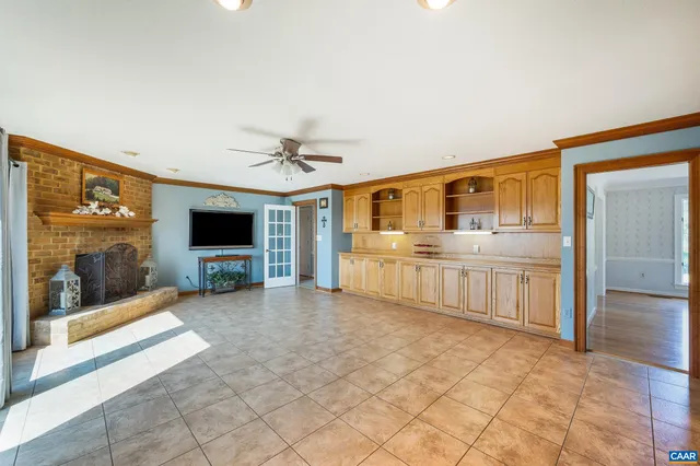 a kitchen with a stove a refrigerator and a sink