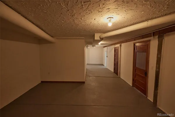 a view of hallway with white walls