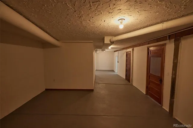 a view of hallway with white walls