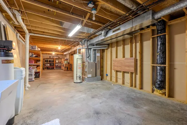 a view of an empty room with wooden roof
