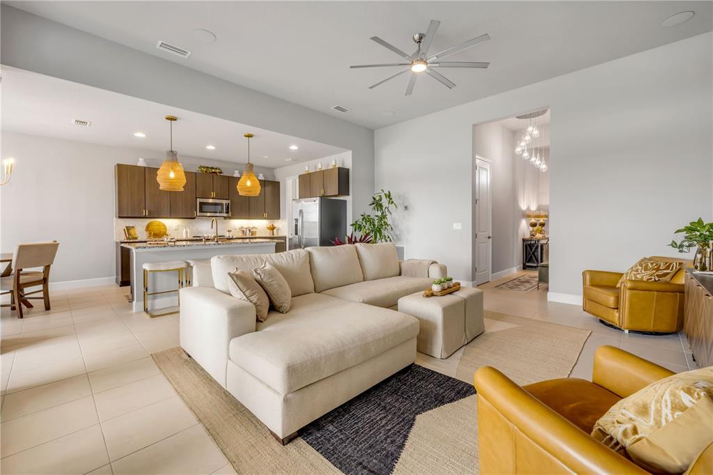 195 Azure Mist Way Daytona Beach, FL 32124 - Photo 15 of 63 a living room with furniture and view of kitchen