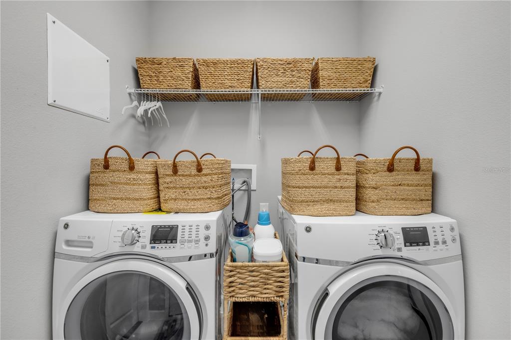 195 Azure Mist Way Daytona Beach, FL 32124 - Photo 43 of 63 a utility room with dryer and washer