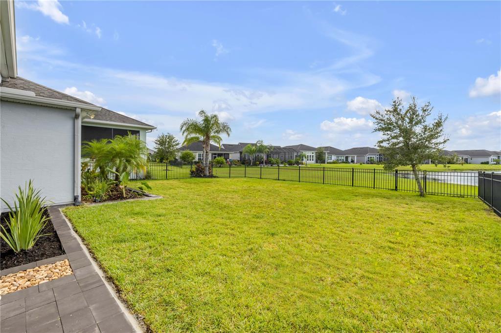 195 Azure Mist Way Daytona Beach, FL 32124 - Photo 48 of 63 a view of an outdoor space and swimming pool