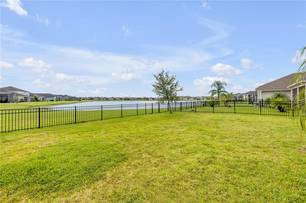 195 Azure Mist Way Daytona Beach, FL 32124 - Photo 49 of 63 a view of a green field with clear sky