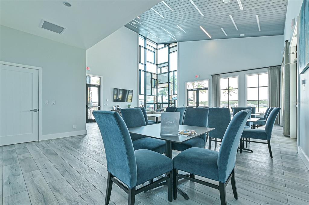 195 Azure Mist Way Daytona Beach, FL 32124 - Photo 56 of 63 a view of a dining room with furniture window and wooden floor