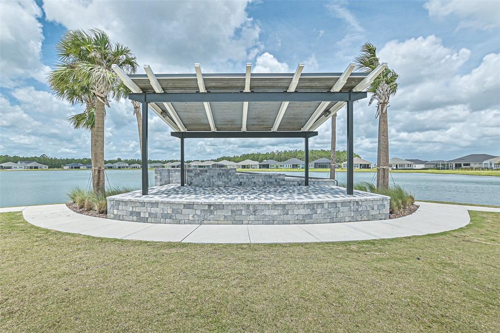 195 Azure Mist Way Daytona Beach, FL 32124 - Photo 7 of 63 a vase of flowers sitting on a table