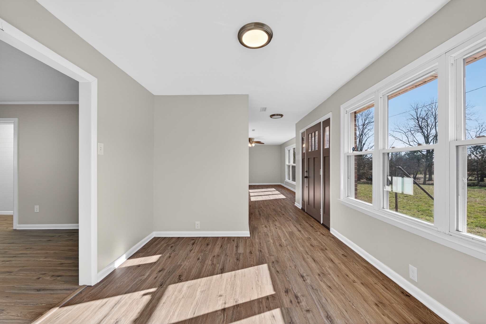 8 East Prospect Road Fayetteville, TN 37334 - Photo 14 of 42 a view of a hallway with wooden floor and staircase