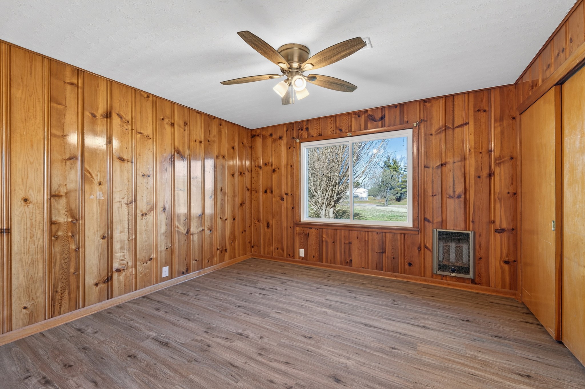8 East Prospect Road Fayetteville, TN 37334 - Photo 17 of 42 wooden floor in an empty room with a window