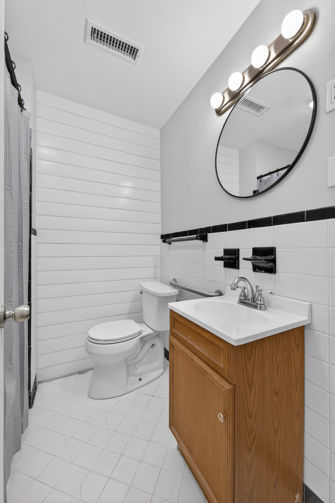 8 East Prospect Road Fayetteville, TN 37334 - Photo 18 of 42 a bathroom with a sink mirror vanity and toilet