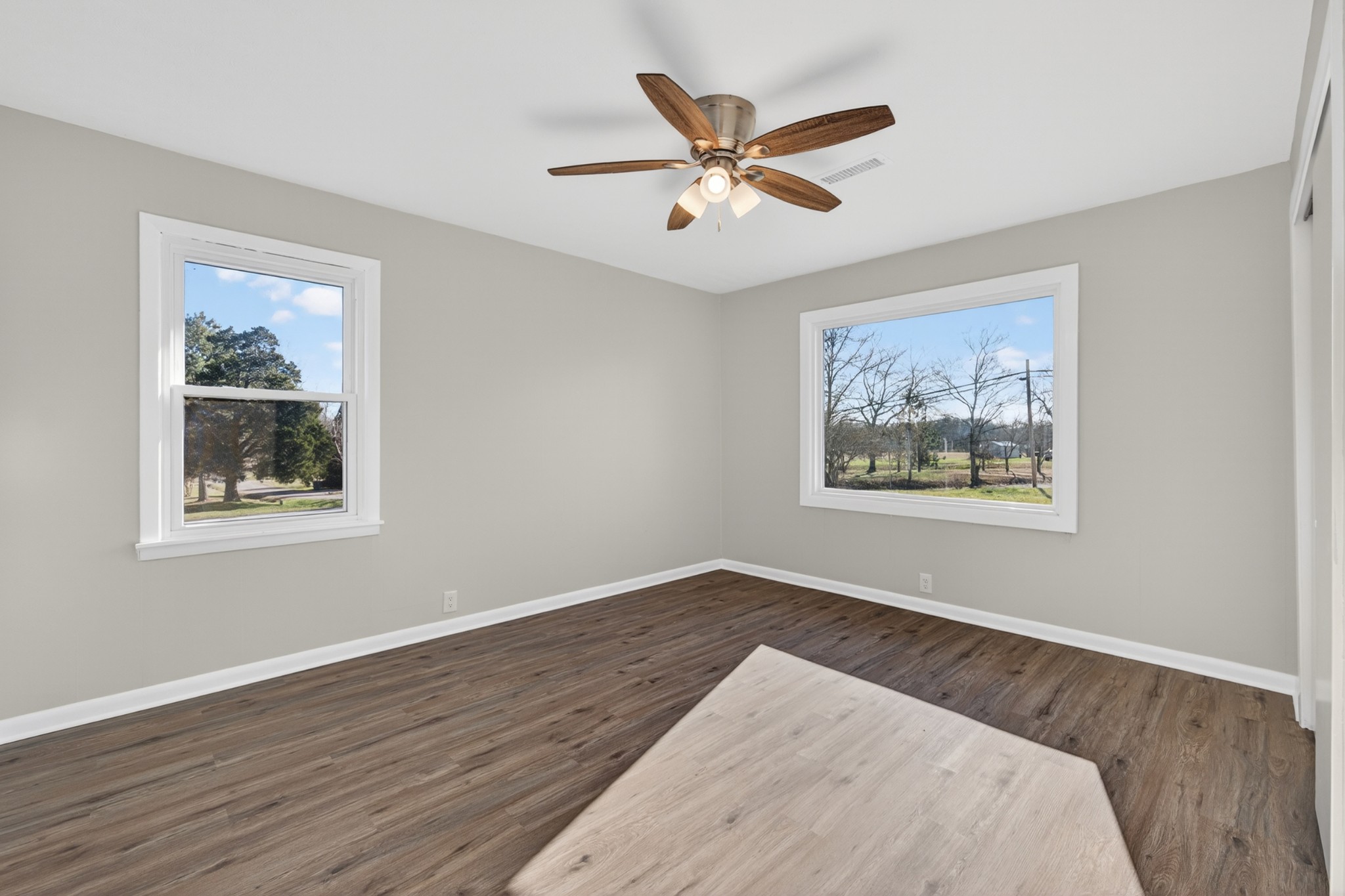 8 East Prospect Road Fayetteville, TN 37334 - Photo 19 of 42 a view of a big room with wooden floor and windows