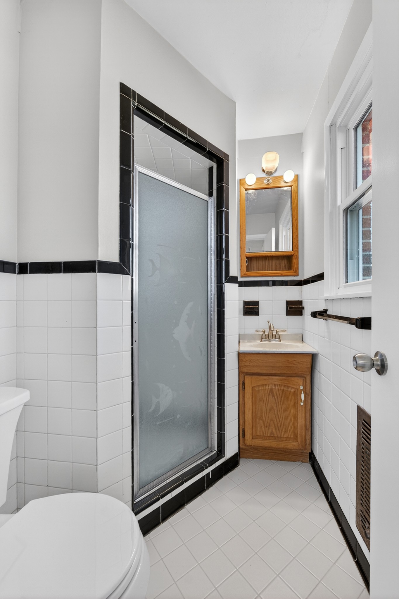 8 East Prospect Road Fayetteville, TN 37334 - Photo 24 of 42 a bathroom with a toilet sink and shower