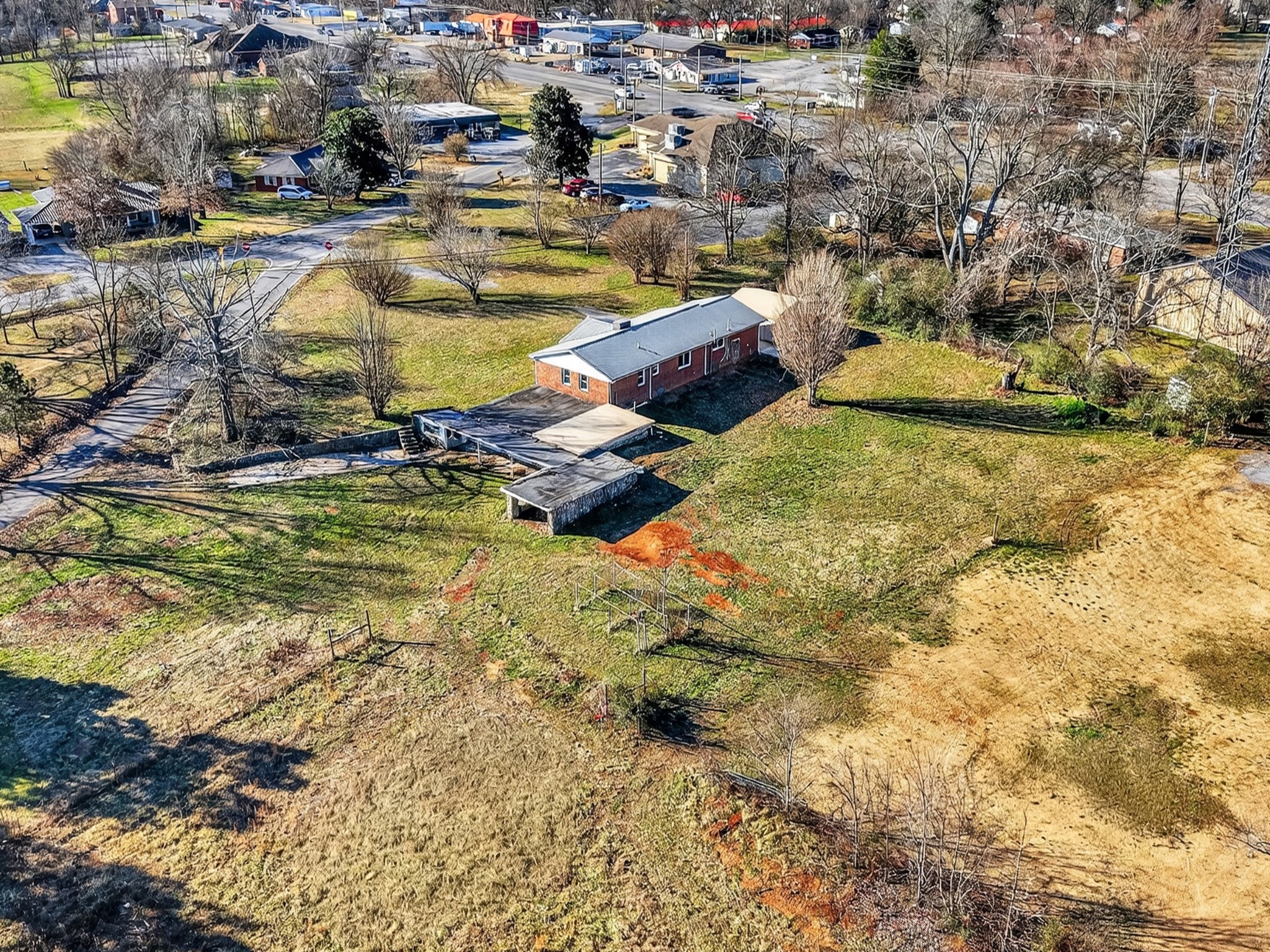 8 East Prospect Road Fayetteville, TN 37334 - Photo 35 of 42 a view of a swimming pool with a lawn chairs and plants