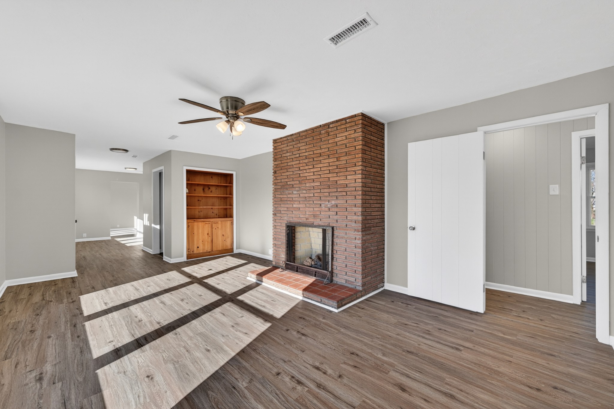 8 East Prospect Road Fayetteville, TN 37334 - Photo 5 of 42 a living room with furniture and a fireplace