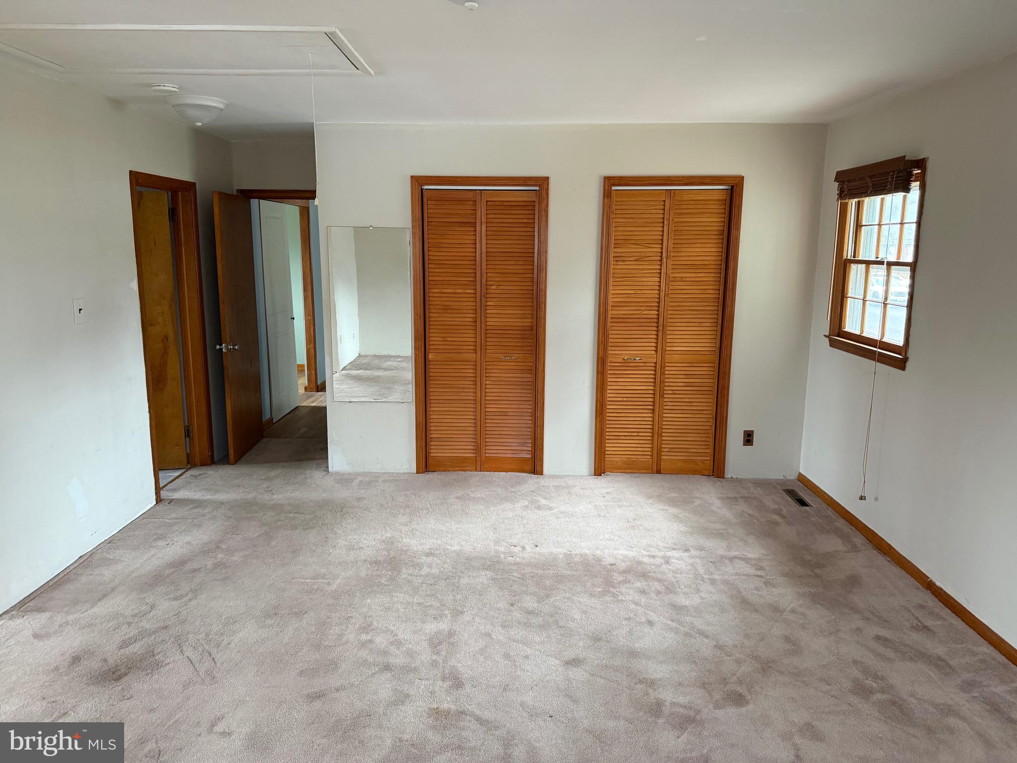 448 Lake Avenue Pitman, NJ 08071 - Photo 15 of 24 an empty room with windows and closet