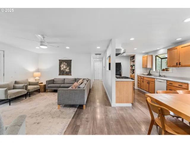 a bedroom with a bed and a mirror