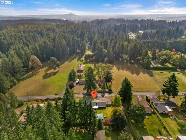 a view of a back yard with an outdoor space