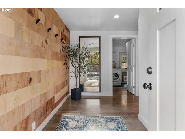a kitchen with a table and chairs in it