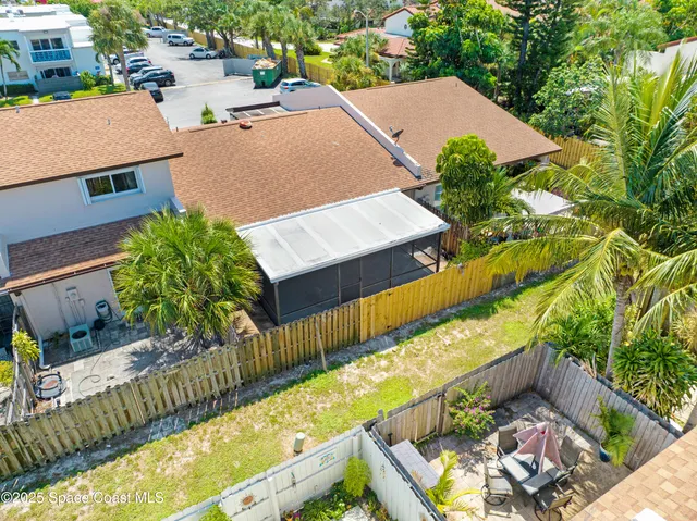 a view of a back yard of the house