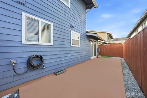 a view of a storage & utility room with two washing machine